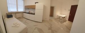 A kitchen or kitchenette at Appartamenti Reali Bonaccini