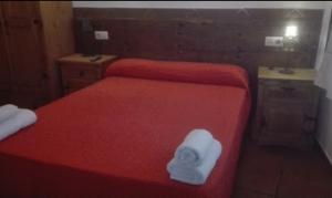 Voodi või voodid majutusasutuse Casa Rural El PARADOR toas