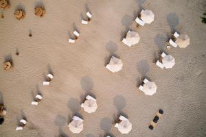 an overhead view of a group of white tables at Casa Joseph Zicatela - Adults Only in Puerto Escondido