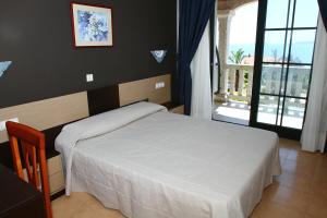 Posteľ alebo postele v izbe v ubytovaní Apartamentos Coral Do Mar II