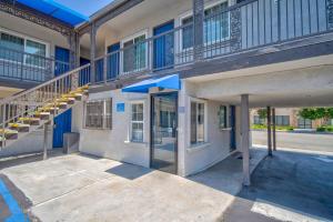 a building with a staircase on the side of it at Studio 6 Rosemead, CA in Rosemead