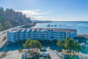 an aerial view of a resort with a body of water at Waters Edge 402 in Lincoln City