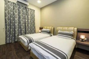 Postel nebo postele na pokoji v ubytování Mbp Leisure Resort