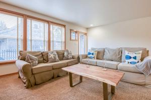a living room with a couch and a coffee table at Beach Break in Pacific City