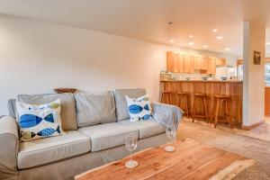 a living room with a couch and a table at Beach Break in Pacific City