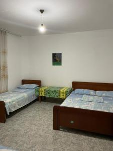 Postel nebo postele na pokoji v ubytování Arta Guesthouse