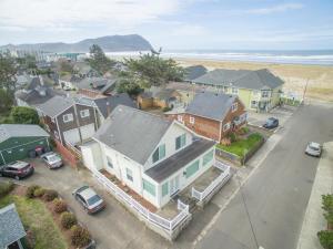 an aerial view of a neighborhood with houses and the ocean at Sand Dollar in Seaside
