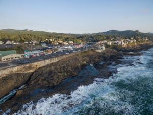 an aerial view of a city and the ocean at Bay Echo in Depoe Bay