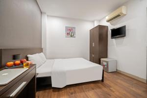 TV a/nebo společenská místnost v ubytování Gold Time Hotel Da Nang