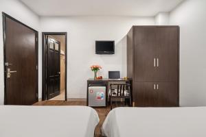 TV a/nebo společenská místnost v ubytování Gold Time Hotel Da Nang