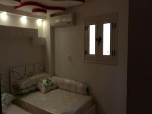 Kép Alnahas St. Two-Bedroom Apartment With Jacuzzi szállásáról Tantában a galériában