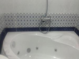 Kép Alnahas St. Two-Bedroom Apartment With Jacuzzi szállásáról Tantában a galériában Még 37 kép