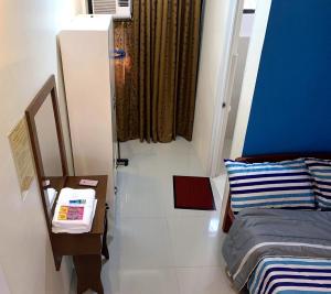 Letto o letti in una camera di The Ideal Place in Cauayan city