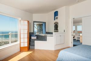 Postel nebo postele na pokoji v ubytování The Lighthouse