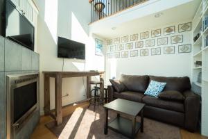 TV a/nebo společenská místnost v ubytování The Lighthouse