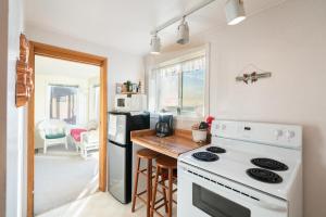a kitchen with a white stove and a counter top at Whale Pointe in Depoe Bay