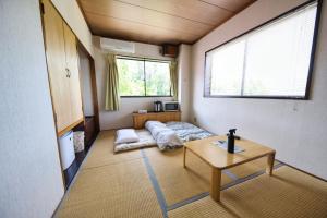 Postel nebo postele na pokoji v ubytování Hotel Camelot