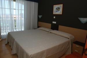 Posteľ alebo postele v izbe v ubytovaní Apartamentos Coral Do Mar II