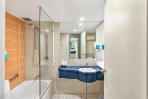 Koupelna v ubytování Novotel Cairns Oasis Resort