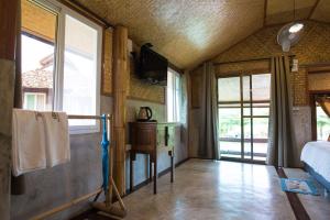 TV a/nebo společenská místnost v ubytování Herntai Resort Maelanoi