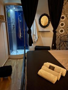 a bedroom with a bed with a towel on it at Casa Di Carla in Canino +26 photos