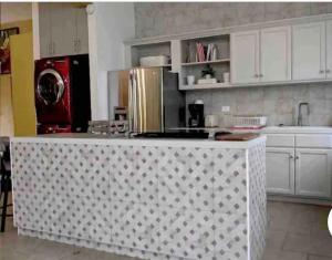 a kitchen with a counter top in a kitchen at las palmas in Ensenada