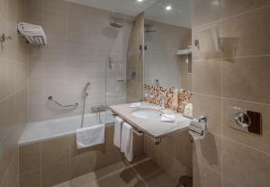 Ванная комната в Hotel Clement