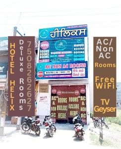 a group of motorcycles parked in front of a building at HOTEL HELIX -- RAJPURA -- Budget Rooms for Family, Couples, Solo Travellers in Rājpura
