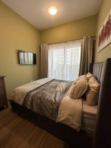 Postel nebo postele na pokoji v ubytování Sport City Apartment