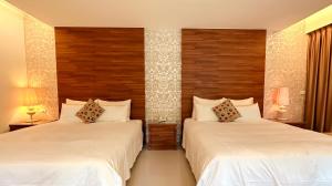 Letto o letti in una camera di Yage Hotspring House