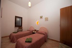 Postel nebo postele na pokoji v ubytování B&B Le 4 Stagioni