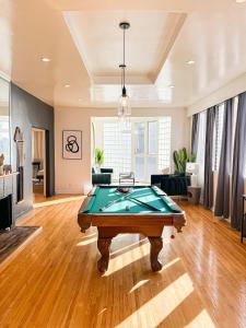 a living room with a pool table in it at Stylish Residence in Los Angeles - OL-WH in Los Angeles