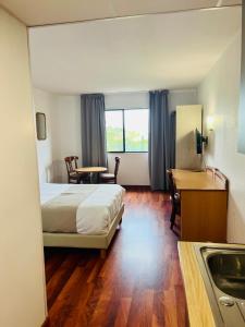 En eller flere senge i et værelse på RESID'ARTEL