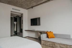 Μια τηλεόραση ή/και κέντρο ψυχαγωγίας στο Tingting Lingshanjiang Light Luxury Art Homestay