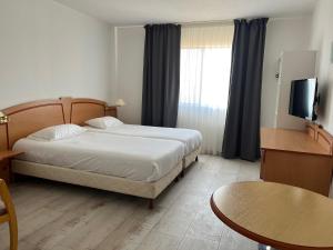 En eller flere senge i et værelse på RESID'ARTEL