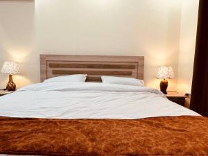 Llit o llits en una habitació de dream house hotel