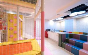 Kuchyň nebo kuchyňský kout v ubytování Jangyu Almond Kids Hotel