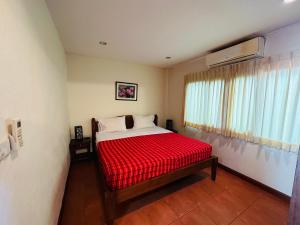 Postel nebo postele na pokoji v ubytování Kata Place Villa
