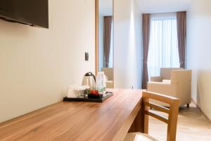 TV o dispositivi per l'intrattenimento presso Kyriad Muscat