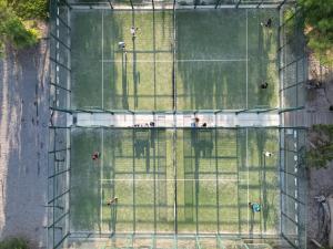 an overhead view of a group of people in a park at Hotel Cala Saona & Spa in Cala Saona