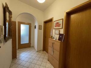 a hallway with a door leading to a room at Haus am Berg in Neunkirchen