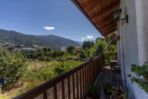 a balcony with a view of the mountains at L'Atelier du Temps - LE SECRET in Aosta