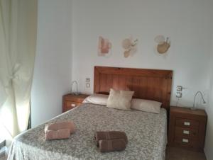 Posteľ alebo postele v izbe v ubytovaní Casa Letizia