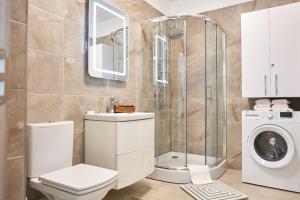 Et badeværelse på Apartament Rise and Shine 1 by Alz