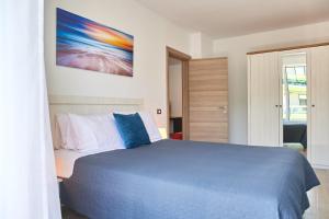 En eller flere senge i et værelse på Apartament Rise and Shine 1 by Alz