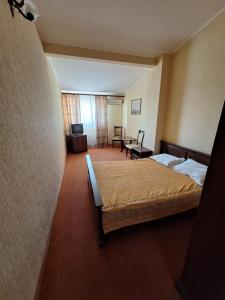 Postel nebo postele na pokoji v ubytování Барселона + 37 fotografií
