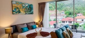 Fotografie z fotogalerie ubytování Karon Holiday Condo by Bcare - WhiteRose v destinaci Karon pláž
