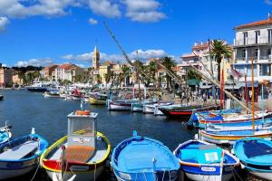 a bunch of boats are docked in a harbor at Rêve de coco, le port à pied in Sanary-sur-Mer