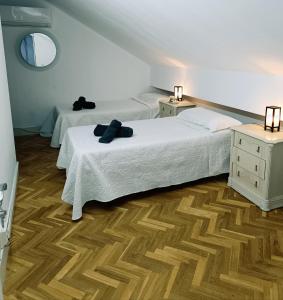En eller flere senger på et rom på Casa de Mirtha