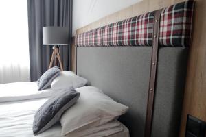 Postel nebo postele na pokoji v ubytování Willa Aniołówka